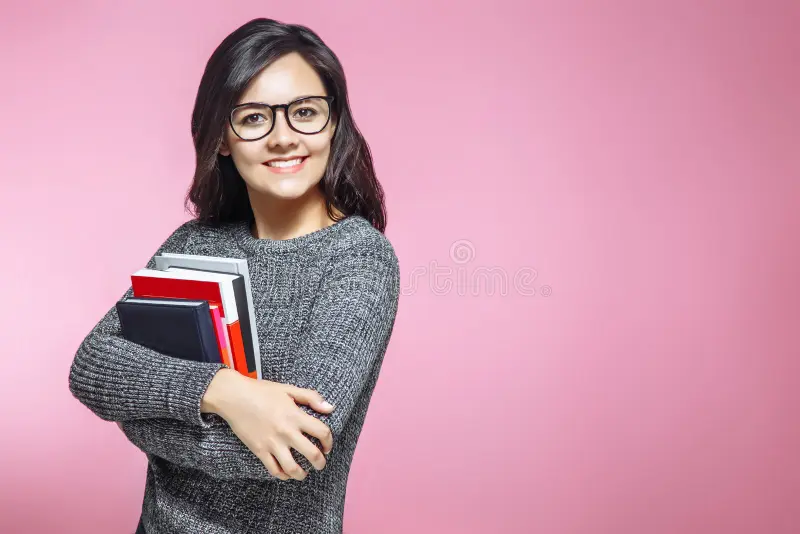 smiling-girl-student-woman-teacher-books-pink-background-smiling-girl-student-woman-teacher-books-pink